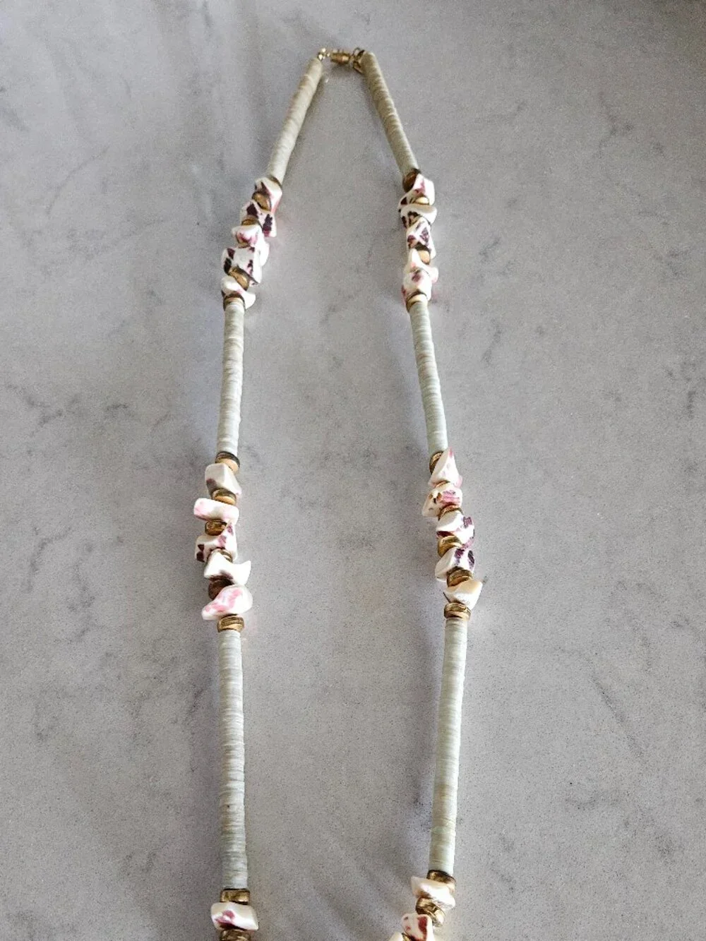 RARE AND VINTAGE KENNETH LANE PUKA / HEISHA SHELL NECKLACE WITH SHELL FRAGMENTS